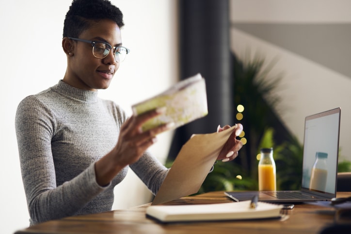 woman-looking-at-mail